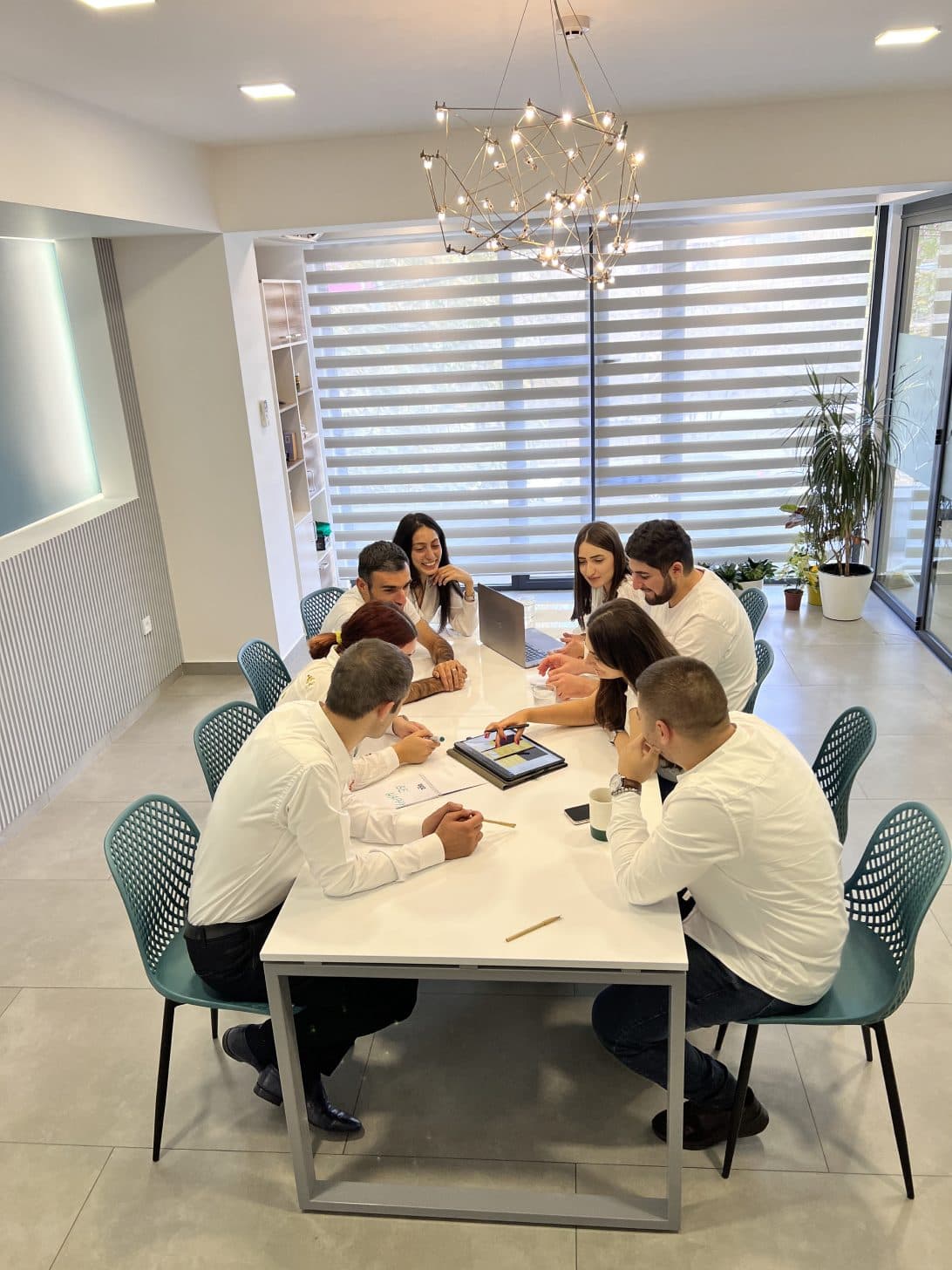 BeeWeb team members in a project discussion